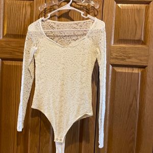 Hollister small cream lacy bodysuit.